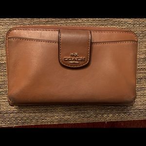 Brown Coach leather wallet clutch